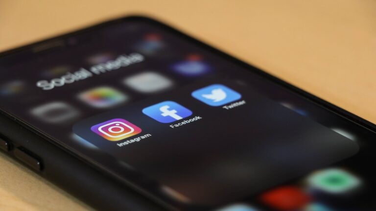 A phone with social media icon going over The Benefits of Social Media For Contractors In Home Improvement