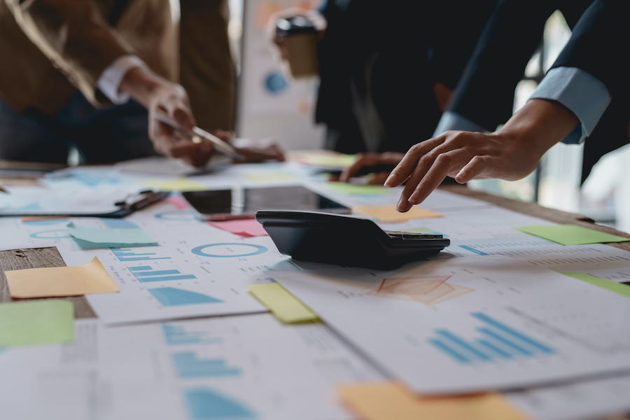 Business Team Analyzing Data at Corporate Workplace