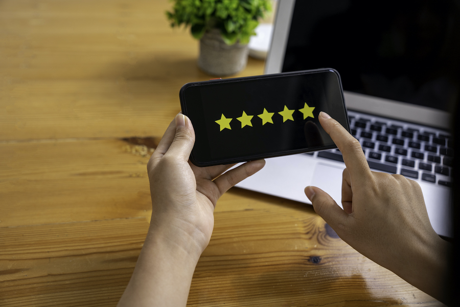 Customer Satisfaction Five Star Rating On Phone Screen